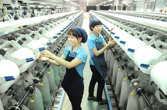 Workers of Thai Tuan Textile and Garment are producing commdities for exports to Middle East (Photo: SGGP)