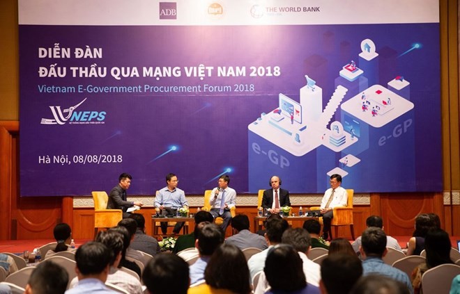 The first national forum on e-procurement takes place in Hanoi on August 8 (Photo: baodauthau.vn)