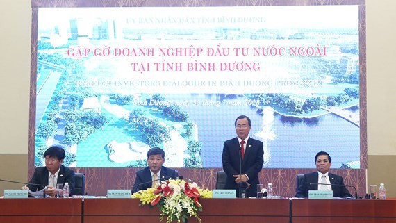 At a meeting between province leaders and enterprises (Photo: SGGP)