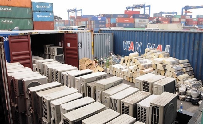 Hundreds of used home electronics banned from import found in containers at Cat Lai Port in HCM City. (Photo: VNA)