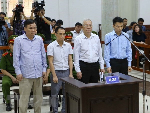 The four defendants, who are former senior members of PVTEX, at the trial on August 28 (Photo: VNA)