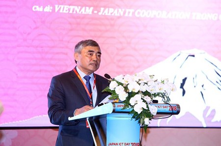 Deputy Minister Nguyen Minh Hong delivered his speech at the 12th Japan ICT Day 2018 on August 29. Photo by Tran Binh