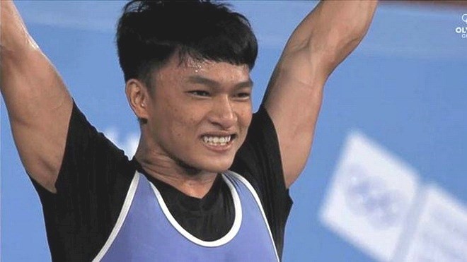 Weightlifter Ngo Son Dinh won a gold medal in the men’s 56kg event at the 2018 Summer Youth Olympic Games in Argentina on October 7. (Photo: Thethaoplus)