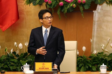 Deputy Prime Minister Vu Duc Dam delivered his appreciation to all scientists who have contributed to the national science and technology. (Photo by VGP)