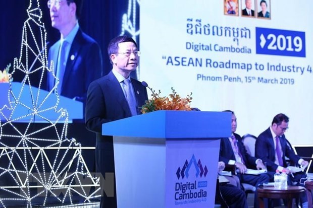 Minister of Information and Communications Nguyen Manh Hung addresses the event (Photo: VNA)
