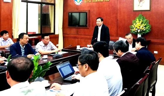 At the yesterday between Agriculture Minister Ngueyn Xuan Cuong and representatives of big livestock corporations (Photo: SGGP)
