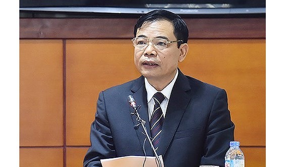 Minister Cuong speaks at the National Assembly session (Photo: SGGP)
