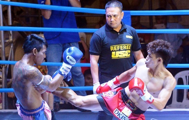 Vietnamese fighter Nguyen Tran Duy Nhat (right). (Photo: news.zing.vn)