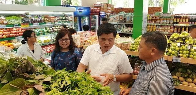 At a Co.op Food franchisee in HCM City. Vietnam offers huge opportunities for convenience store franchisers. — Photo courtesy of Saigon Co.op