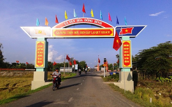 The path leads to Dong BInh Commune in Can Tho City ( Photo: SGGP)