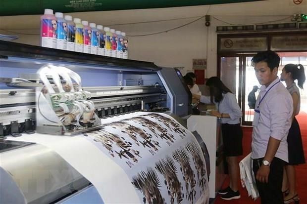 More environmentally friendly solutions for printing is important for the industry's sustainable development, according to a recent conference held in HCM City (Photo: VNA)