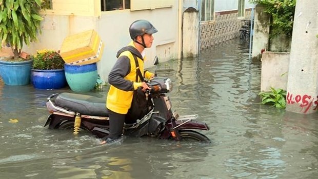 A street flooded due to high tides in HCM City’s district 8 (Source: VNA)
