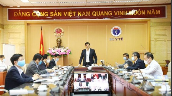 Deputy Health Minister Nguyen Thanh Long at the conference (Photo: VNA)