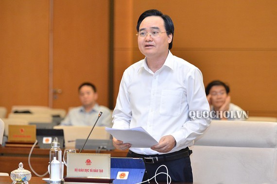 Education Minister Phung Xuan Nha at Committees of the National Assembly's working session (Photo: Quochoi)
