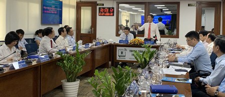 Minister of Industry and Trade Tran Tuan Anh shared solutions to form connections between his ministry and media units. (Photo: SGGP)
