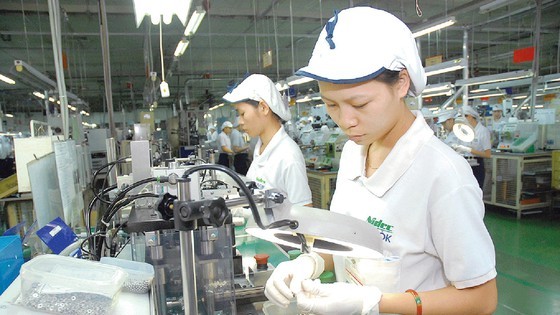 Vietnamese workers at a Japanese -invested company (Photo: SGGP)