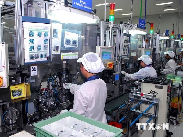 Workers on an electronic component production line at Saigon Hi-Tech Park. — VNA/VNS Photo