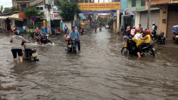 A two- hour downpour floods the city roads