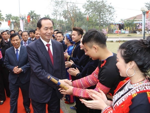 President Tran Dai Quang in the village (Source: VNA) 