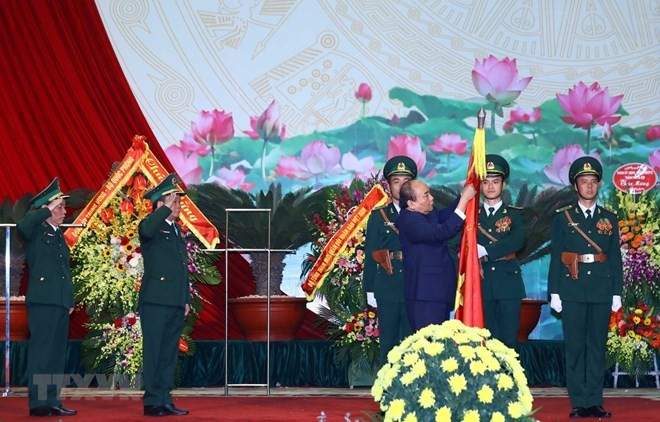 Prime Minister Nguyen Xuan Phuc presents first-class Feat of Arms Order to Border Guard Force (Source: VNA)
