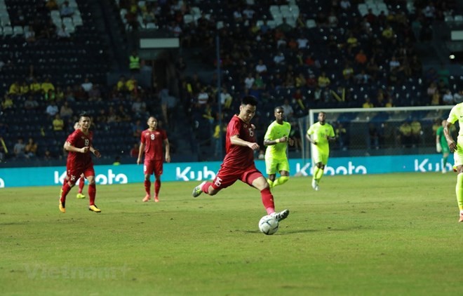 Midfielder Duc Huy (No. 15) equalised for Vietnam at the 83rd minute (Photo: VNA)