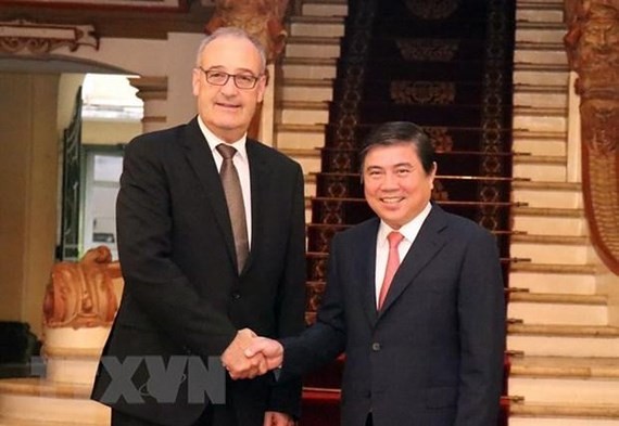 Chairman of the Ho Chi Minh City People’s Committee Nguyen Thanh Phong and Minister of the Federal Department of Economic Affairs, Education and Research (EAER) of Switzerland Guy Parmelin
