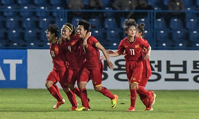Vietnamese women celebrate their victory over Thailand at the Asian Games in August 2018 (Photo: VNA)