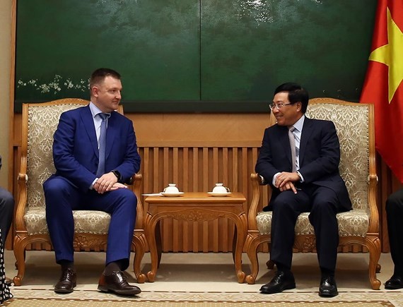 Deputy Prime Minister Pham Binh Minh meets with Head of the Russian Federal Agency for Youth Affairs Alexander Bugayev. (Photo:VGP)