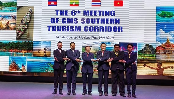 Representatives of four countries posed at the sixth Meeting of Greater Mekong Sub-region (GMS) Southern Tourism Corridor 