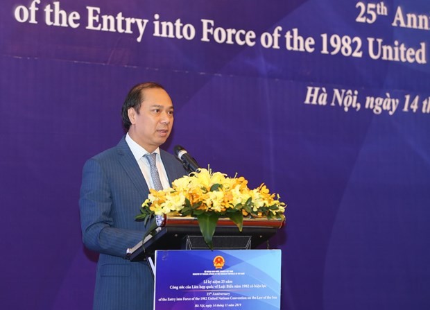 Deputy Foreign Minister Nguyen Quoc Dung addresses the ceremony in Hanoi on November 14 (Photo: VNA)