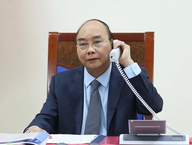 Prime Minister Nguyen Xuan Phuc has phone talks with his Russian counterpart Mikhail Mishustin on April 21 (Photo: VNA)