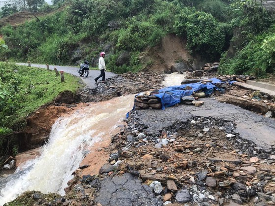 Huge flooding separates traffic roads through Bat Xat District, Lao Cai Province