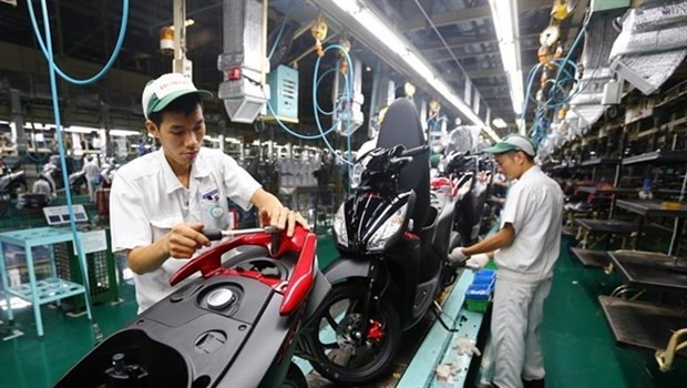 The national programme is considered a new push to support enterprises in the context of the Fourth Industrial Revolution (Photo: vietq.vn)