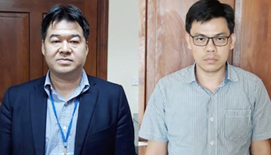 Nguyen Hoai Giang and Pham Xuan Quang who are arrested by the police. (Photo: SGGP) 