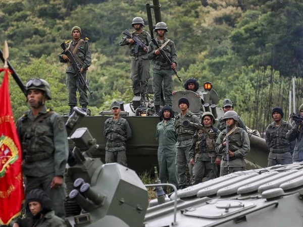 Binh sĩ Venezuela triển khai tại Caracas ngày 25-8. Ảnh: EPA