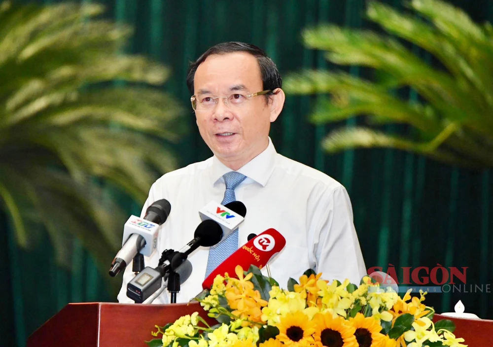 Bí thư Thành ủy TPHCM Nguyễn Văn Nên trình bày báo cáo những nội dung chủ yếu Nghị quyết 31 của Bộ Chính trị về phương hướng, nhiệm vụ phát triển TPHCM đến năm 2030, tầm nhìn đến năm 2045. Ảnh: VIỆT DŨNG