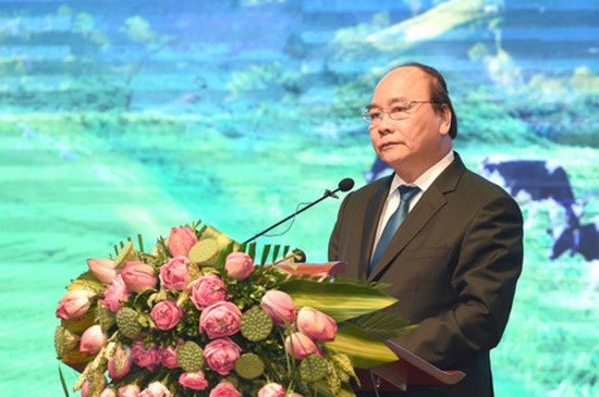 政府總理阮春福在2017年山羅省投資促進會議上發表講話。（圖源：越通社）