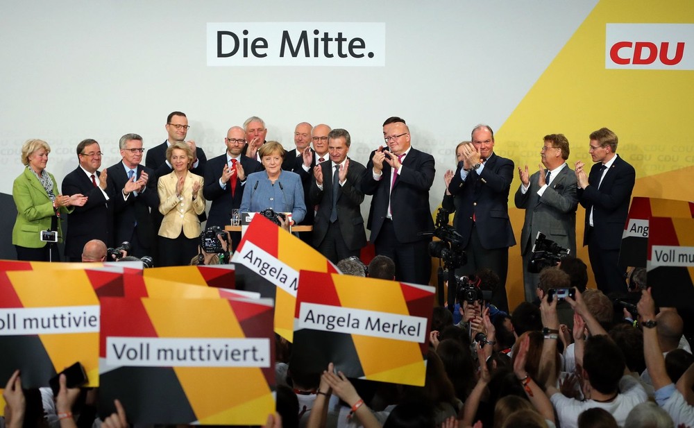 德國總理默克爾在大選領先後接受祝賀。（圖源：新華網）