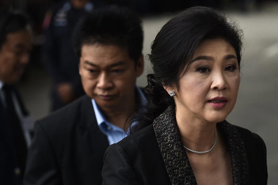 泰國最高法院27日對“大米瀆職案”宣判，英祿仍未能出庭，法庭判處英祿5年有期徒刑。圖為8月1日英祿出庭。（圖源：Getty Images）