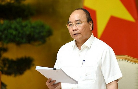 政府總理阮春福主持會議並發表重要講話。（圖源：光孝）