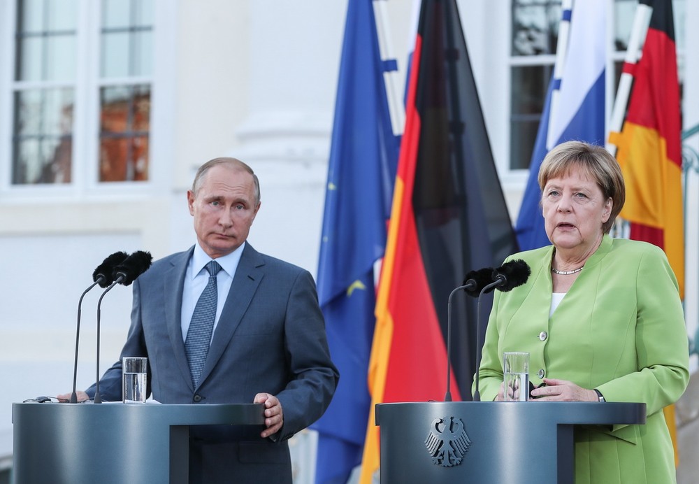 德總理默克爾(右)與俄總統普京出席記者會。（圖源：秋水）