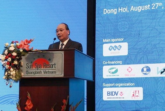 政府總理阮春福在2018年廣平省投資促進會議上致詞。（圖源：陲潘）