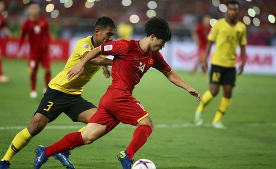 越南隊(紅衣)-馬來西亞隊比賽一瞥。（圖源：互聯網）
