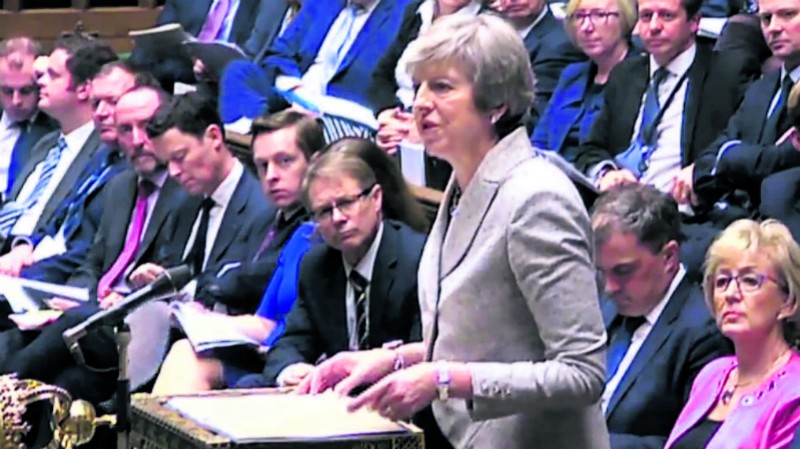 22日，特雷莎·梅向英國議會報告談判最新進展。  （圖源：AFP）
