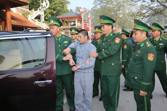 警方從中國公安部接領農文起國際通緝犯。（圖源：黎和）