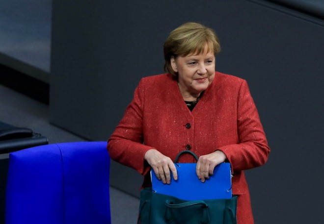 12月12日，德國柏林，歐盟峰會前夕，德國總理默克爾在聯邦議院出席會議並參加議會問答。（圖源：互聯網）