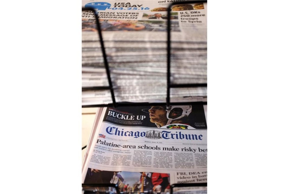 美國論壇出版公司遭網路攻擊，導致《芝加哥論壇報》等報紙延遲出報。（圖源：AP）