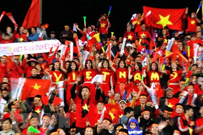 球場上助威的越南球迷。（圖源：互聯網）