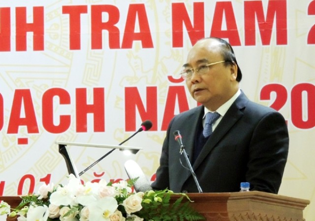 政府總理阮春福在會議上發表講話。（圖源：明范）