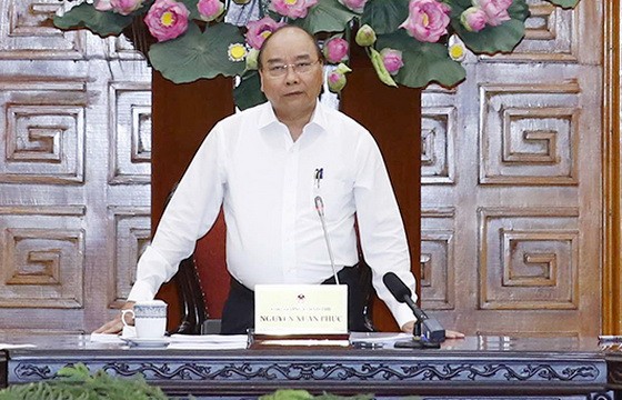 政府總理阮春福在會議上發表講話。（圖源：VGP）